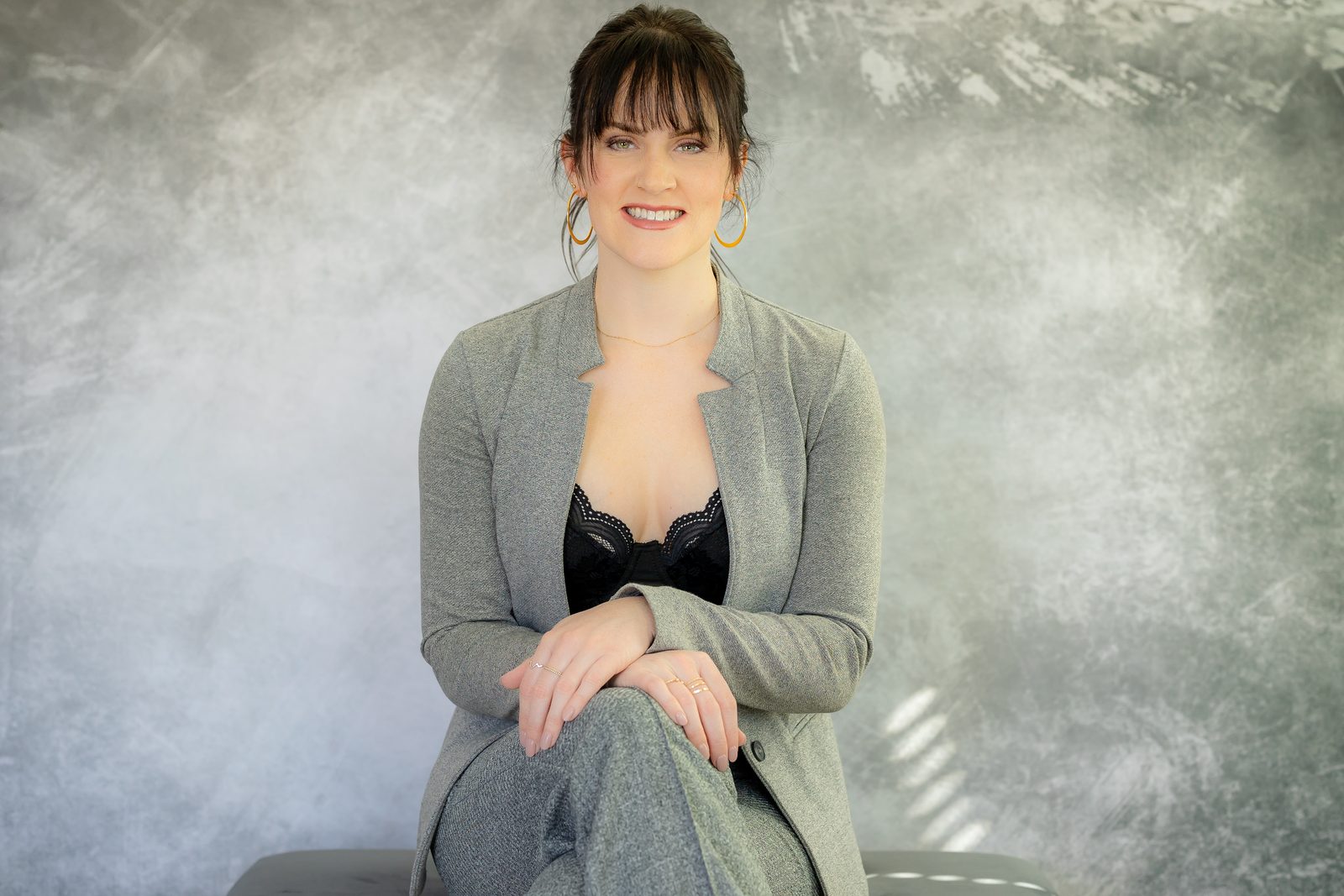 Personal branding portrait, soft tan backdrop