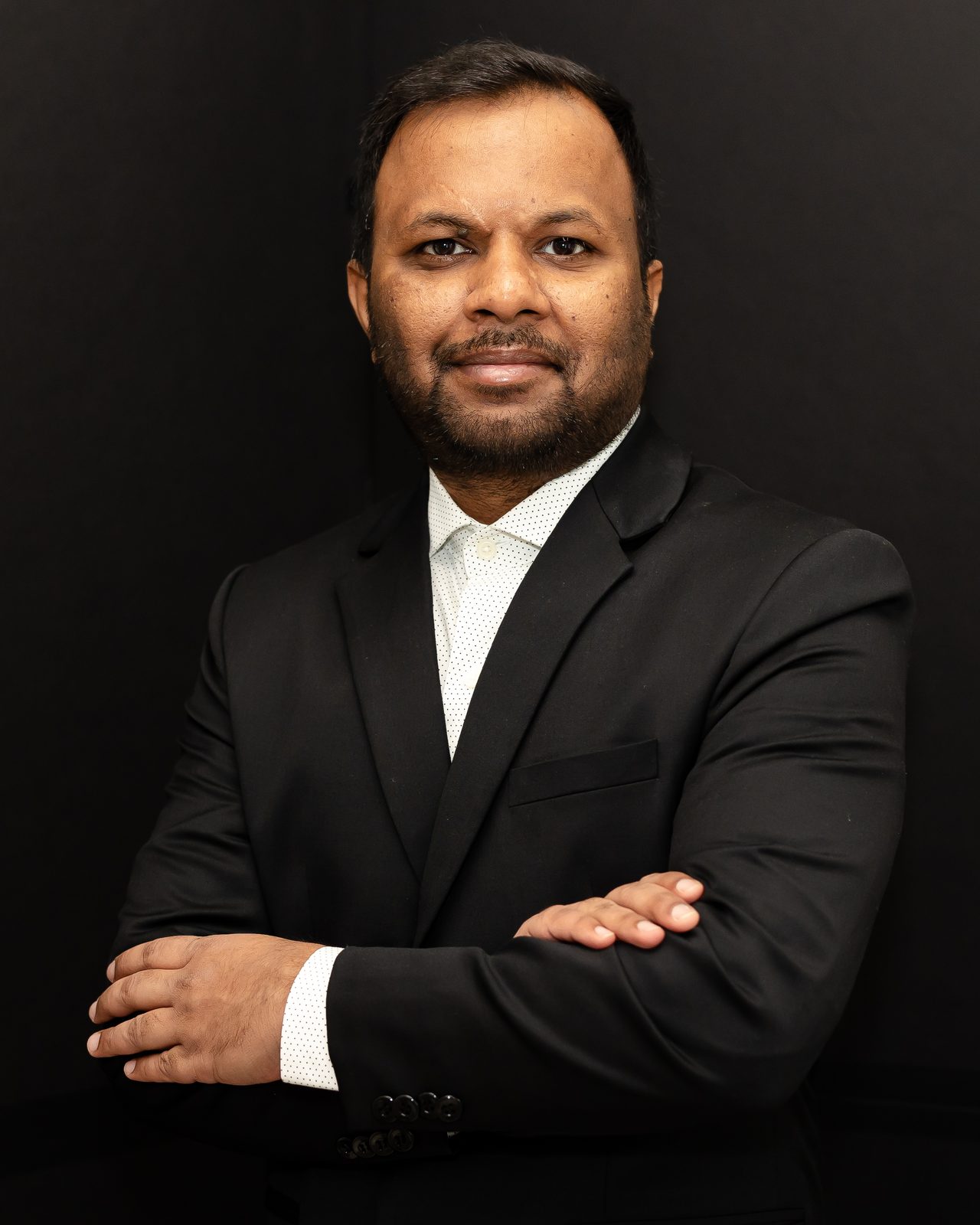 Personal branding headshot, soft grey backdrop